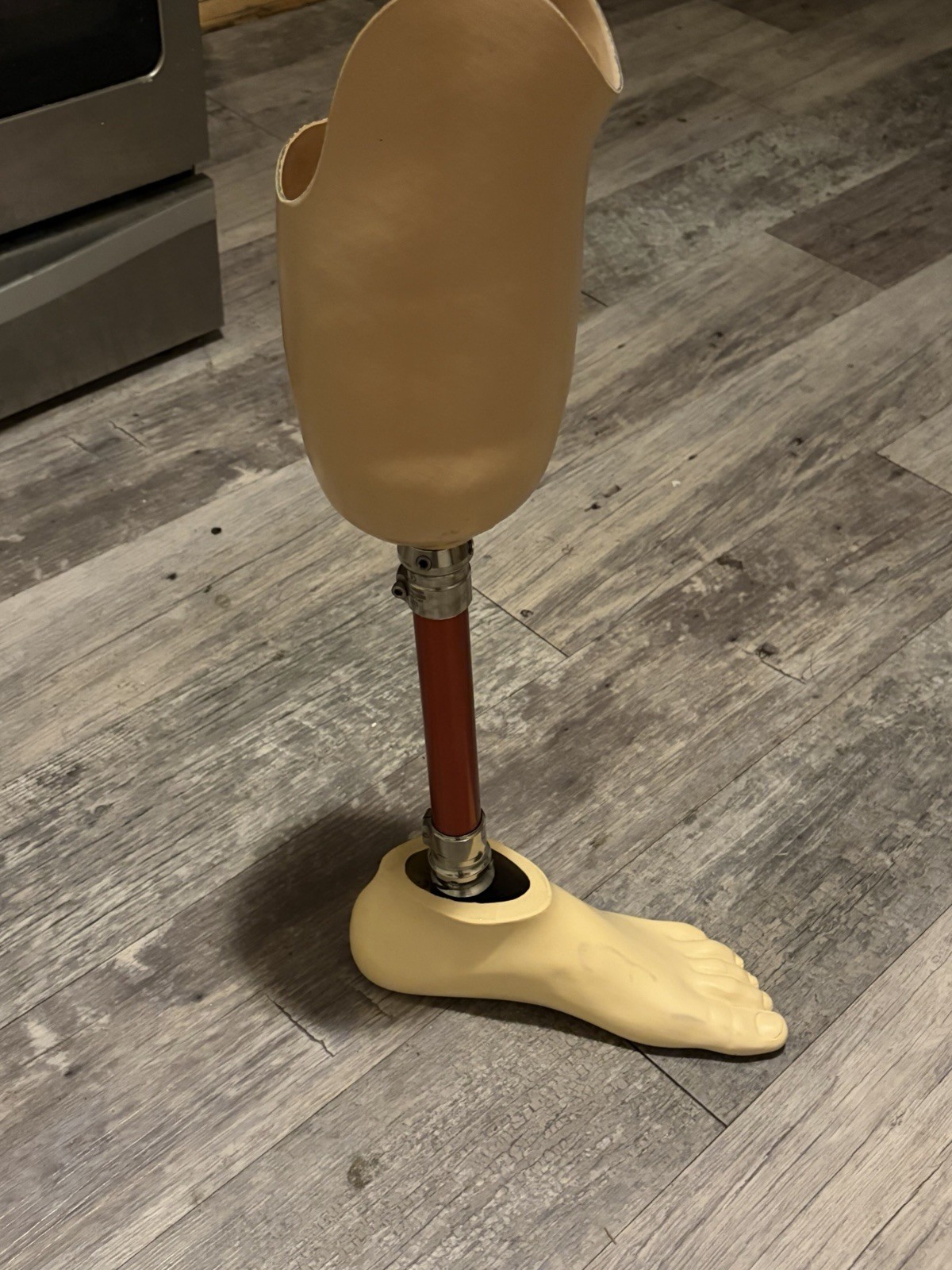 a transfemoral prosthesis (an artificial leg for an below the -knee amputation