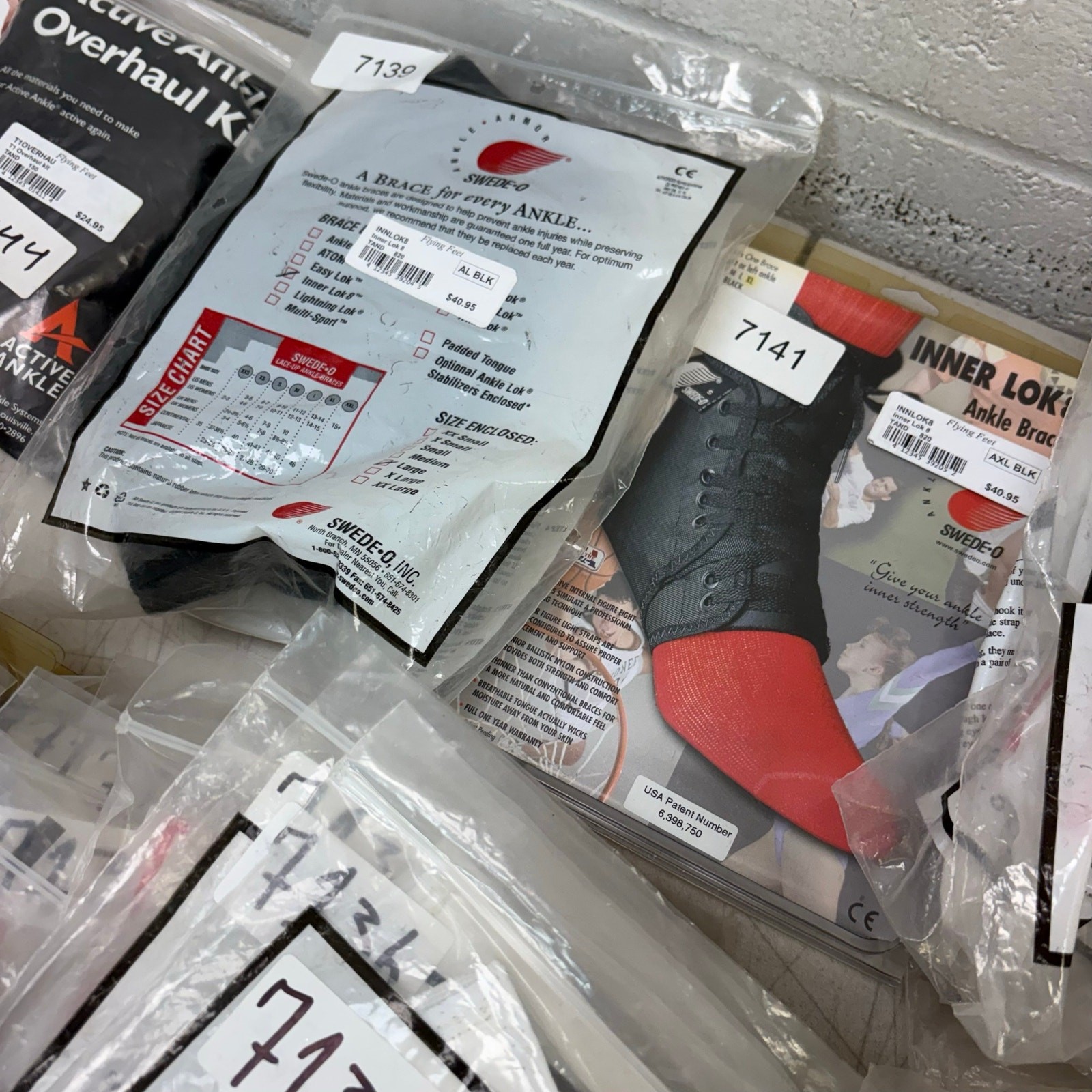 LOT-OF-85 Swede-O Ankle Braces, Assortment of Sizes, XXS-XXL, White & Black