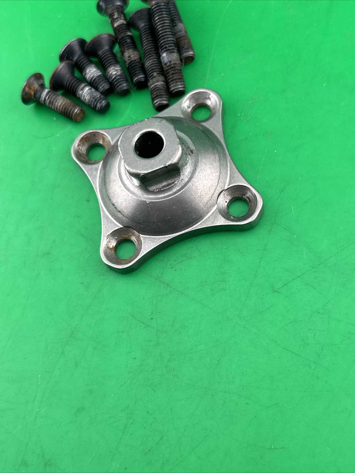 Prosthetic 4 Hole Plate Adapter Component. Titanium