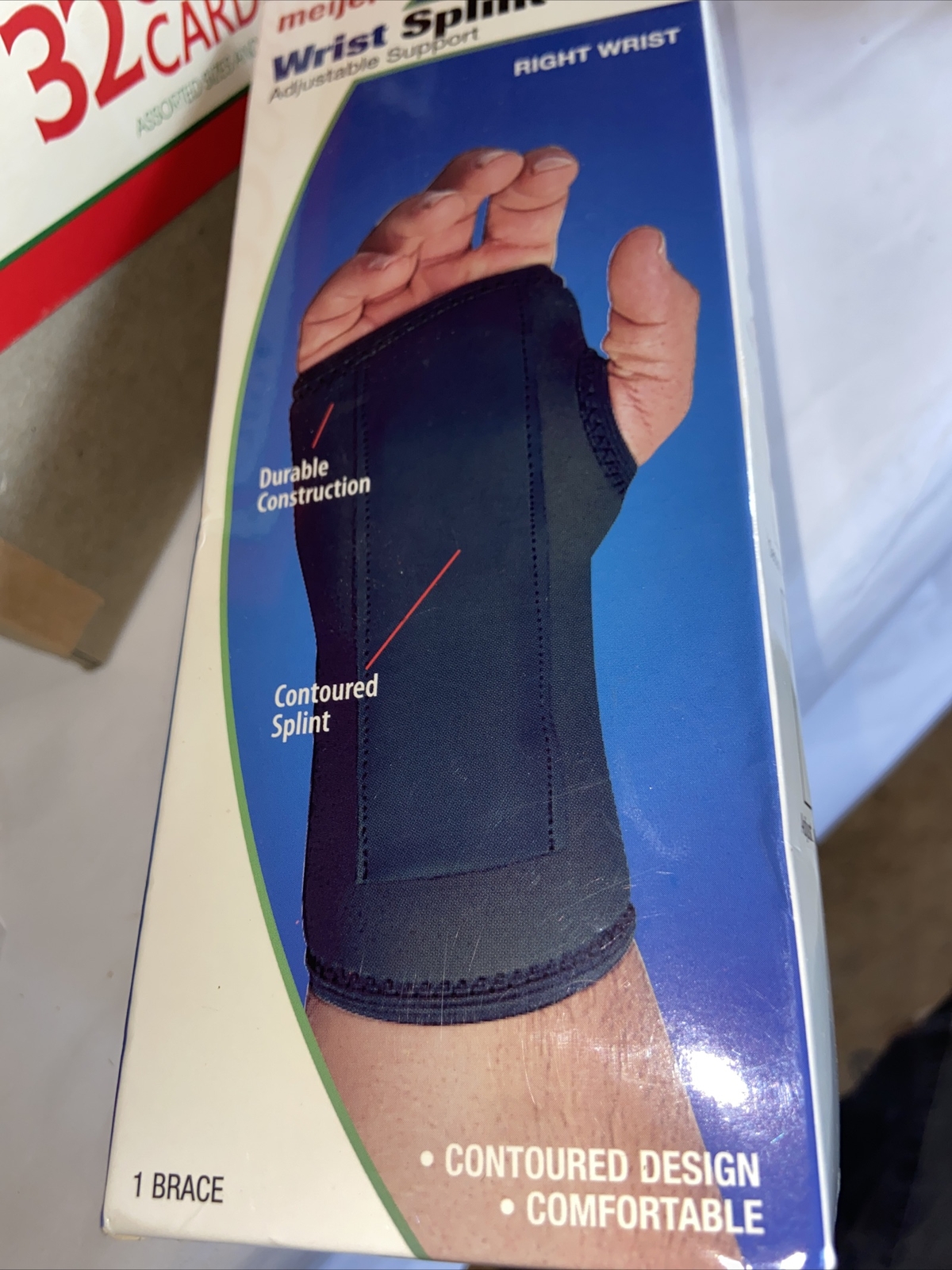 New in Box Meijer Wrist Splint, Left Wrist Adult One Size Fits All Black Brace