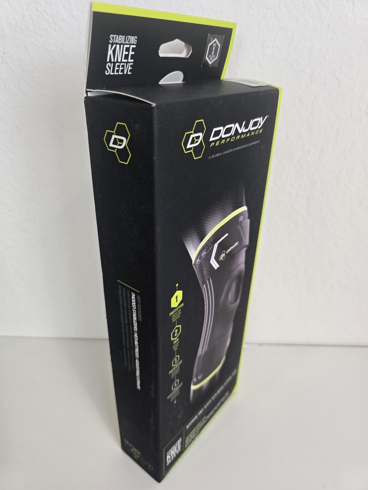 DonJoy Performance Stabilizing Knee Sleeve Neoprene Side Stays Adjustable S