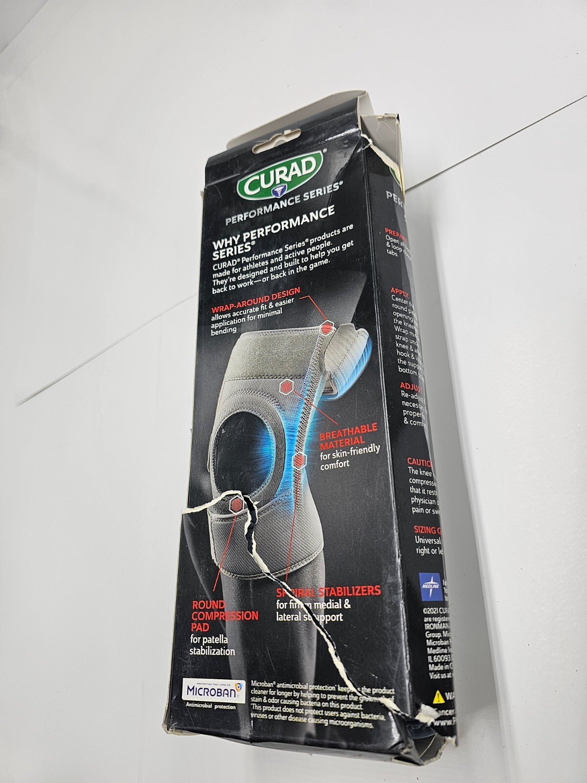 Curad Performance Ironman Series Strap Knee Support  / Round Compression Pad