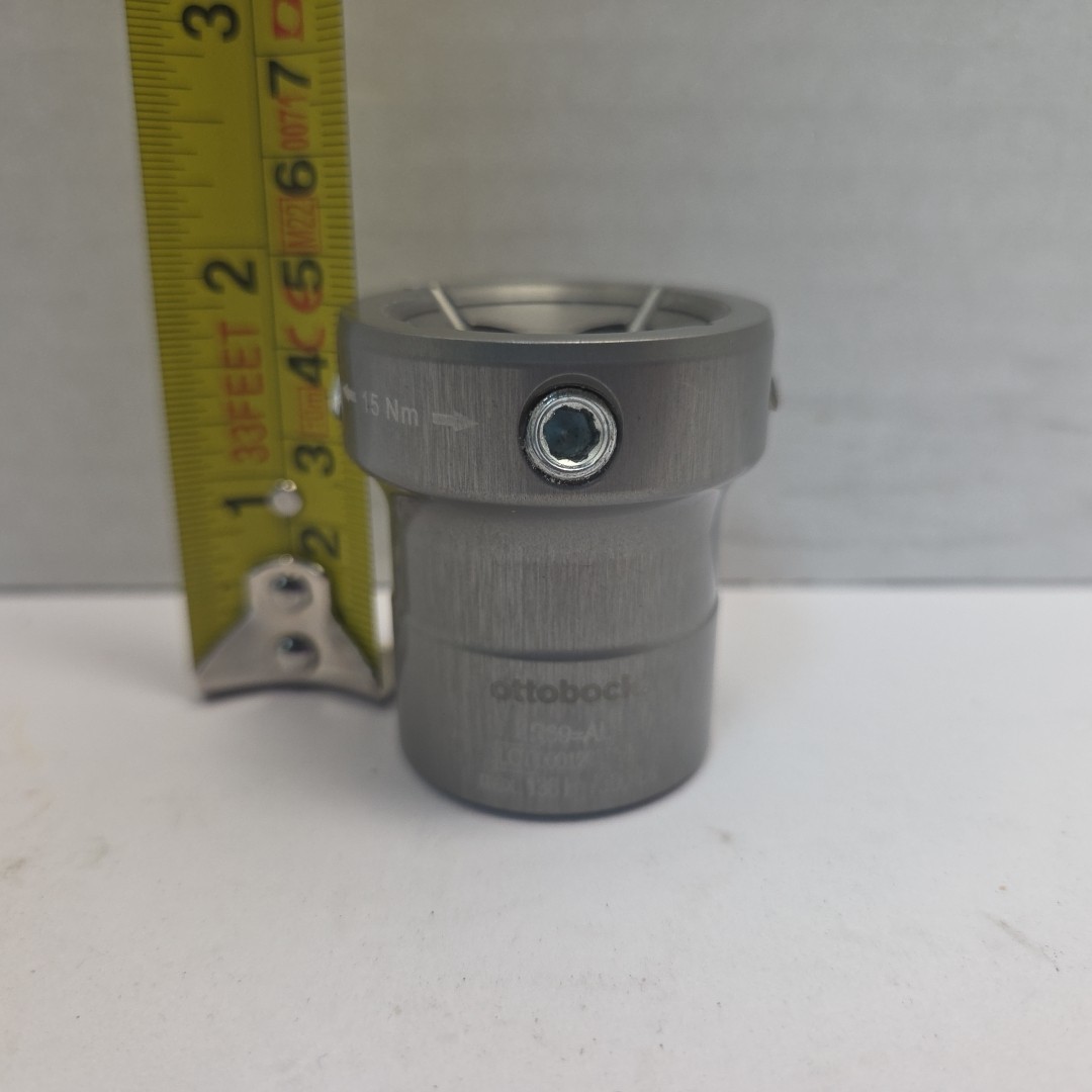 Prosthetic component adapter part. Otto Bock 4R69=AL prosthetic tube clamp.