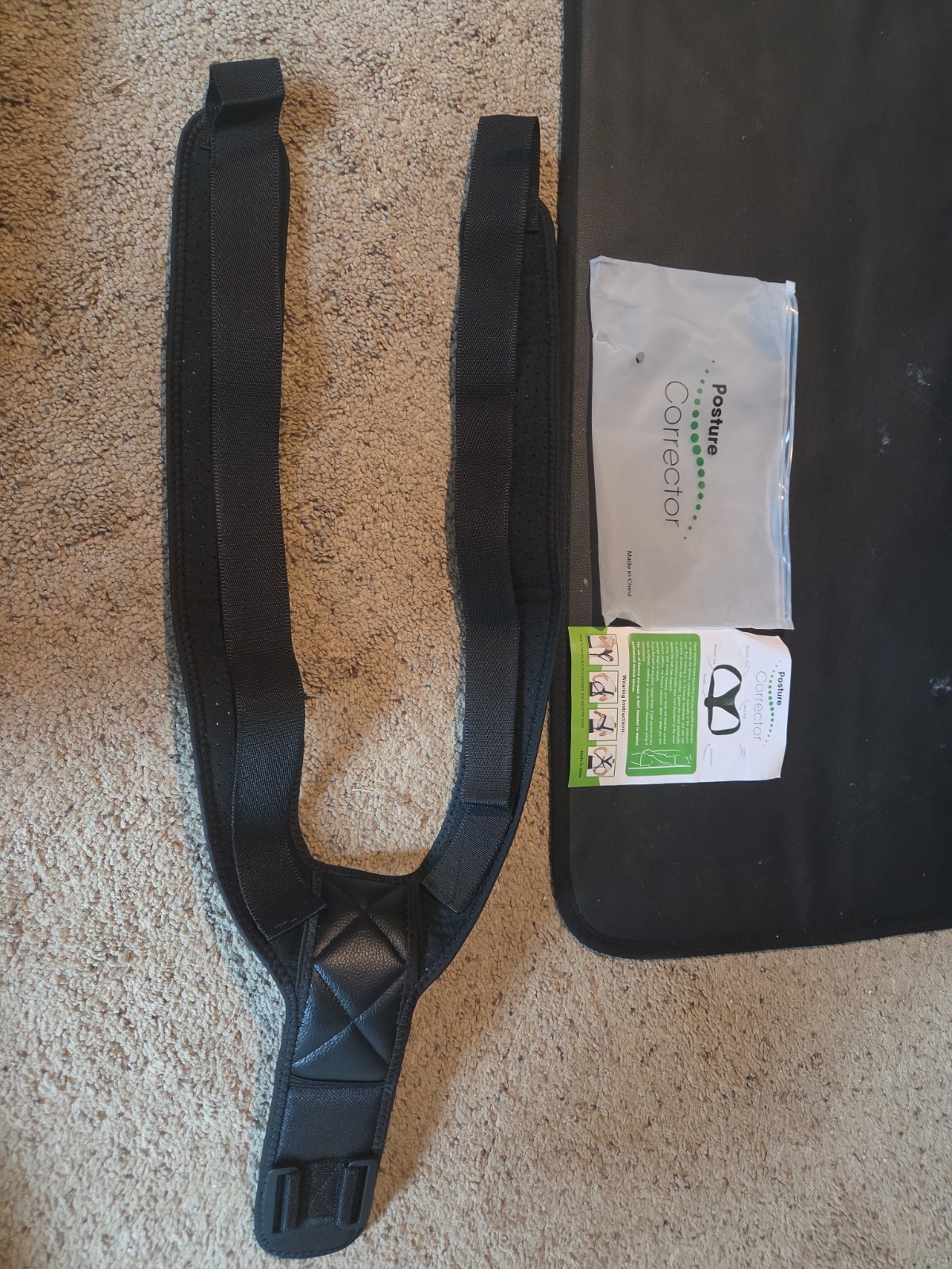 NWT Posture Corrector, black in color