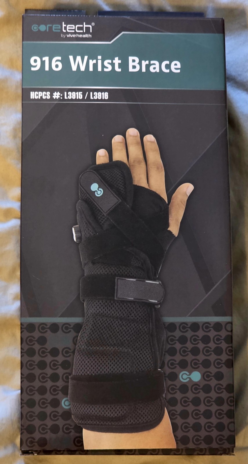Coretech 916 Universal Wrist Brace Black, Left/Right. HCPCS #L3915/L3916