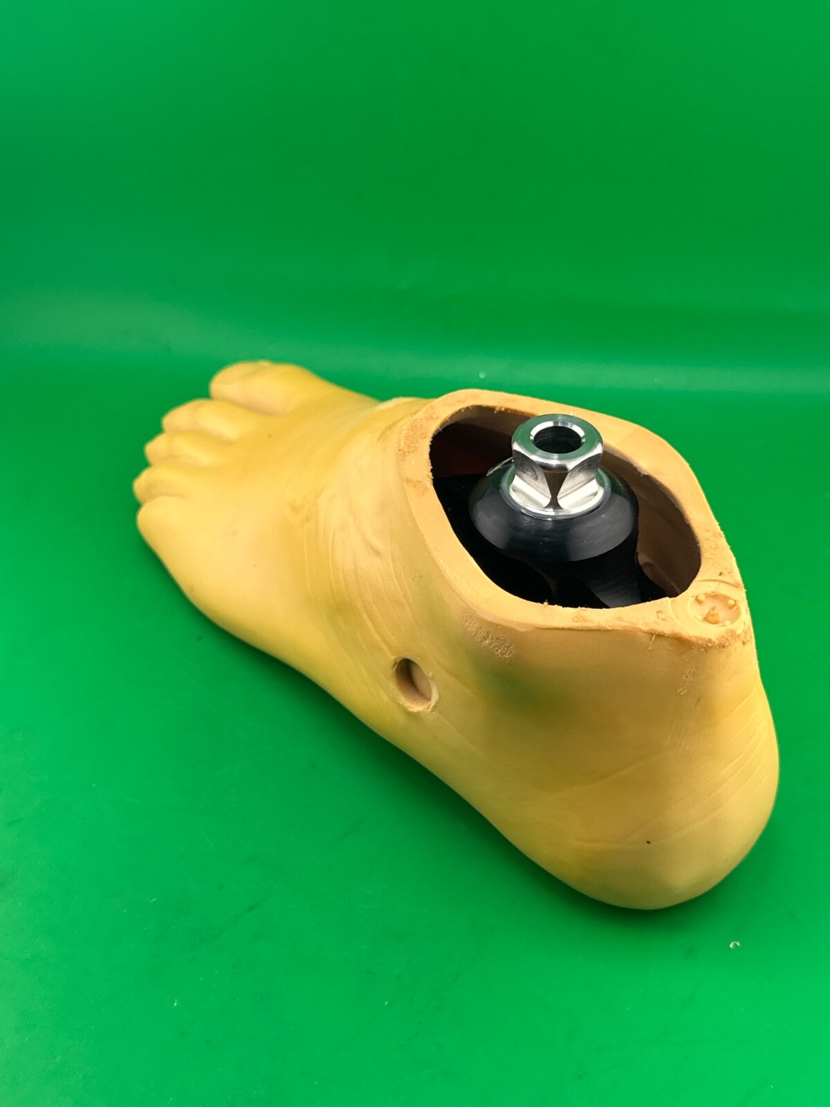 Uniprox single axis prosthetic foot. Left. Size 26