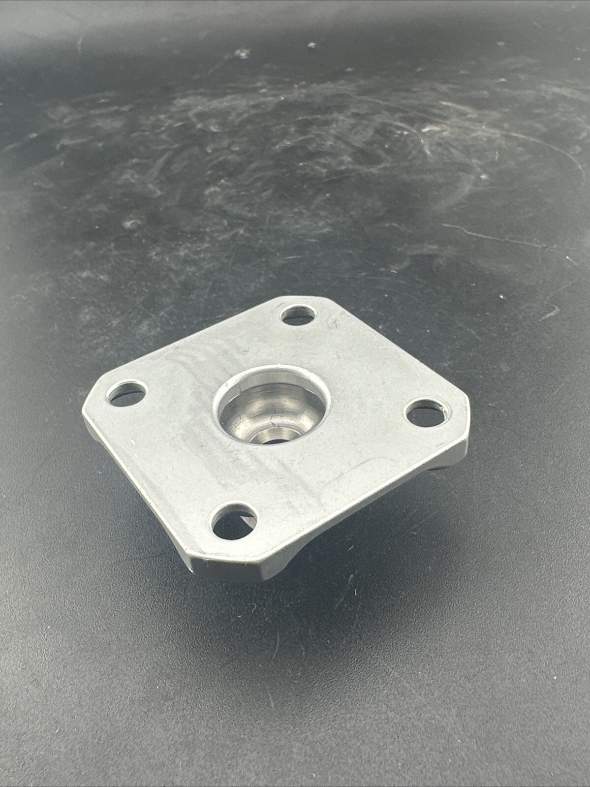 Ossur Prosthetic Four Hole plate Adapter Component.