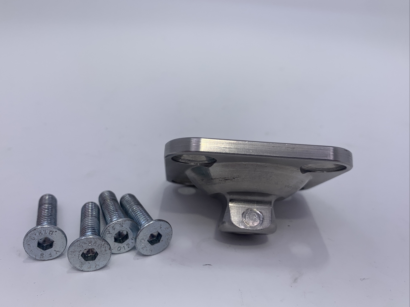 Bulldog prosthetic leg part, component, adapter, 4 hole male pyramid plate.