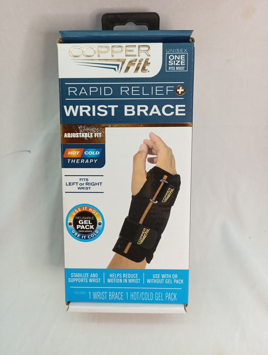 Copper Fit Rapid Relief Wrist Brace. Adjustable Hot/ Cold