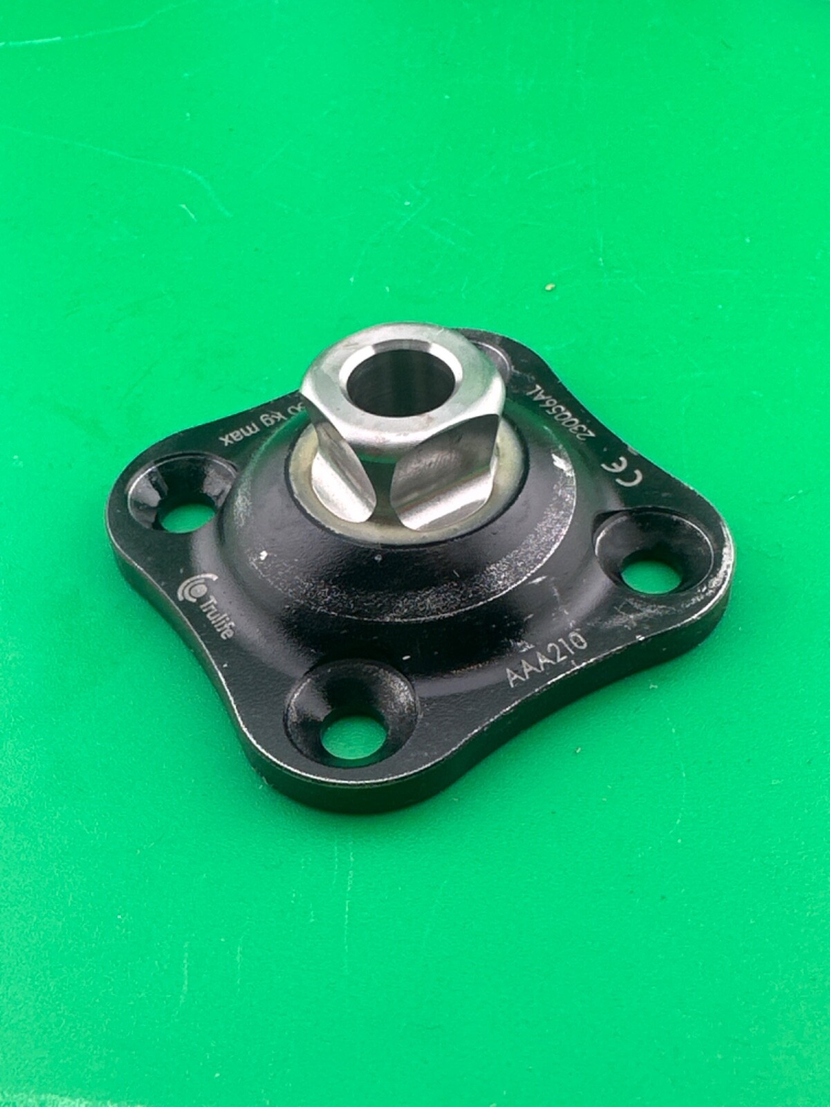 Prosthetic component adapter part. Trulife 4 four hole plate. AAA210