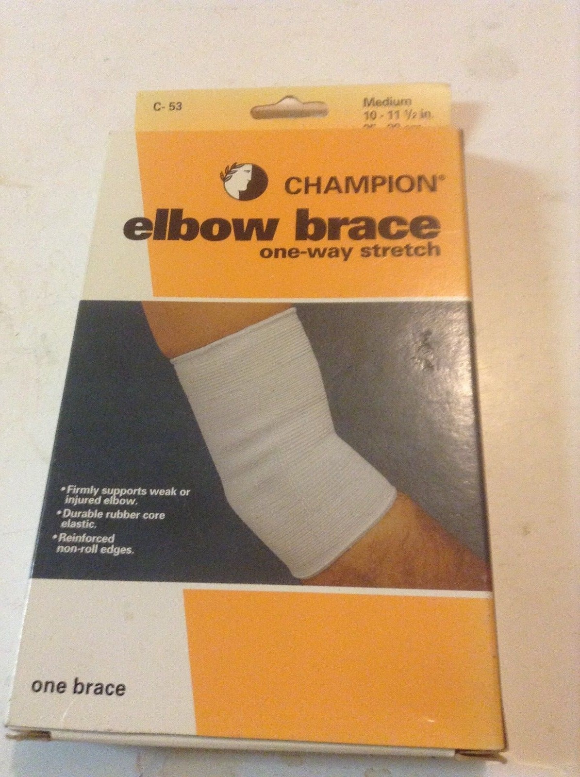 CHAMPION ELBOW BRACE, medium white, one way stretch , c-53