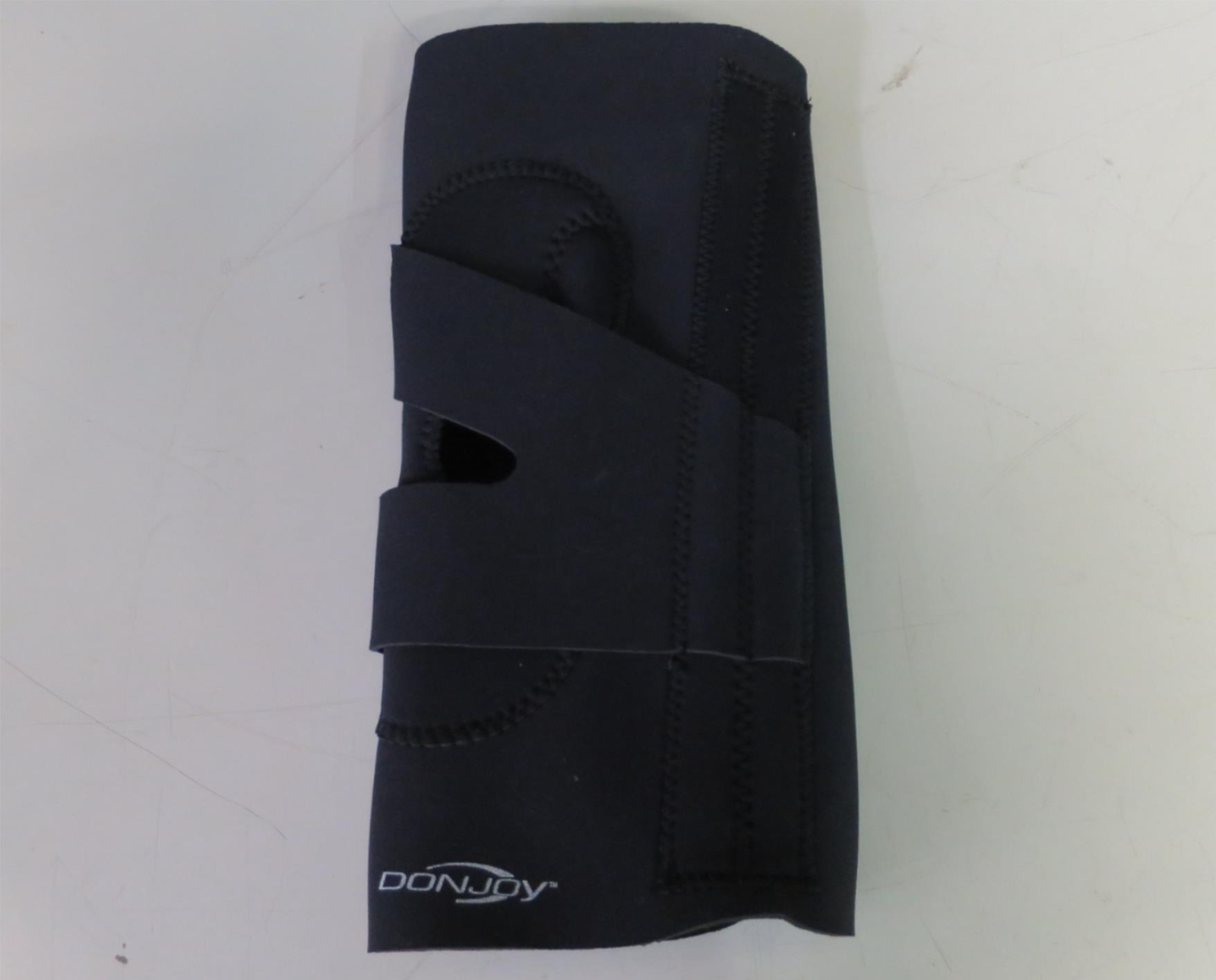 DonJoy 11-0321-4-06060 Lateral “J” Slip-On Knee Support L Left, Black