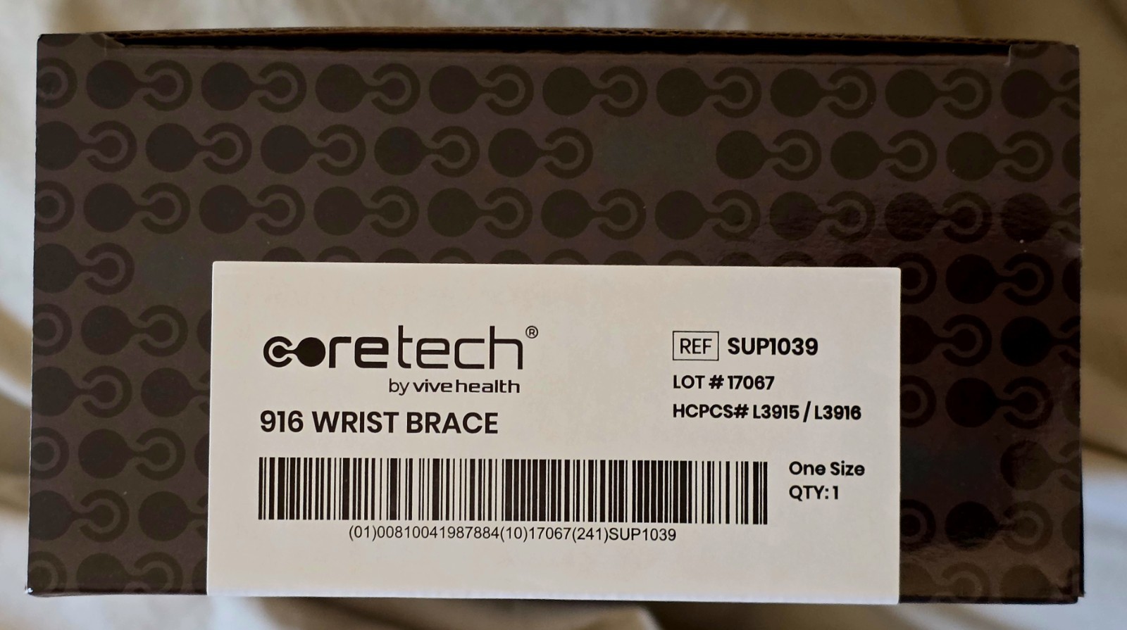 Coretech 916 Universal Wrist Brace Black, Left/Right. HCPCS #L3915/L3916