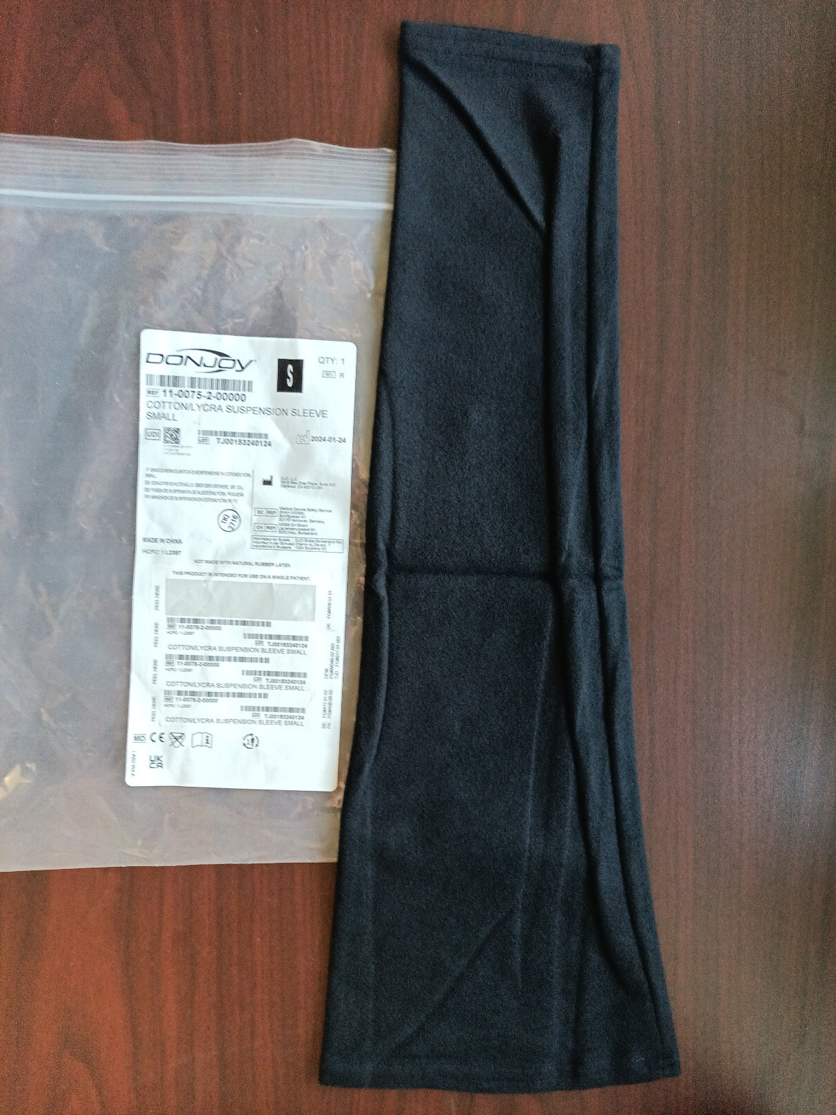 DonJoy OA Adjuster Cotton/Lycra Suspension Sleeve for Knee Braces Black Small