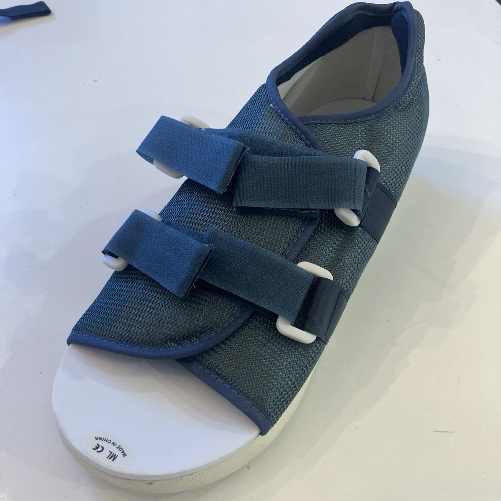 Walking boot and 2x post-op shoes