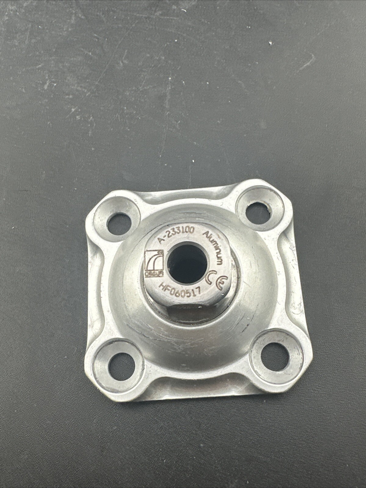 Ossur Prosthetic Four Hole plate Adapter Component.