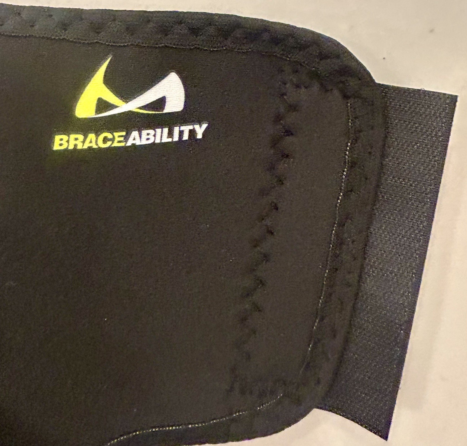 BraceAbility XXL Hinged Knee Brace adjustable wraparound design side hinge