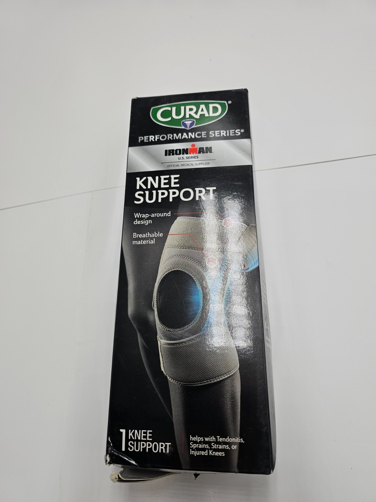 Curad Performance Ironman Series Strap Knee Support  / Round Compression Pad