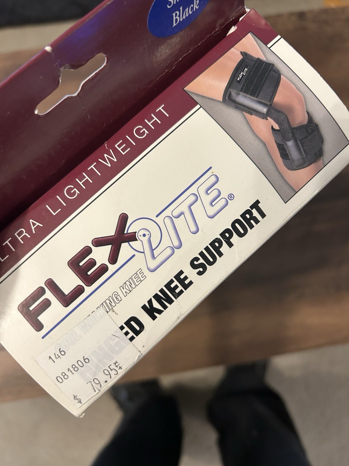 FLA orthopedics Flexlite hinged knee brace knee support Small Black