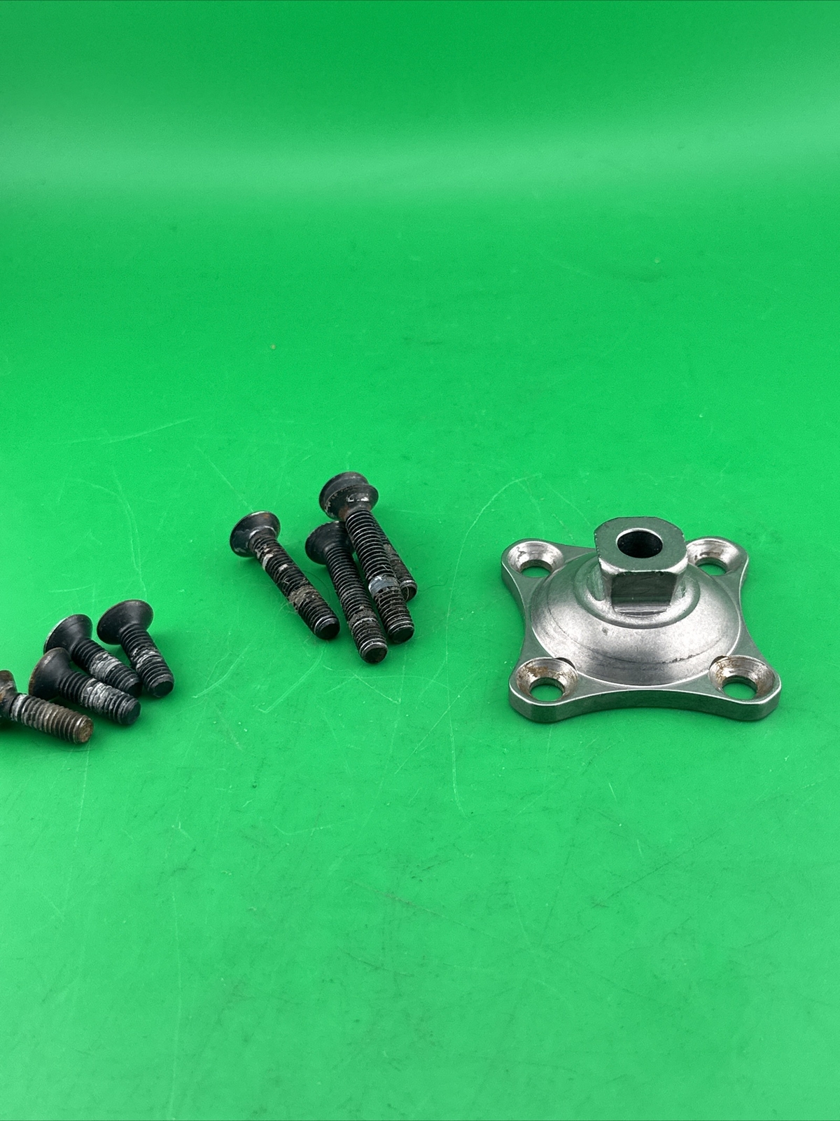 Prosthetic 4 Hole Plate Adapter Component. Titanium