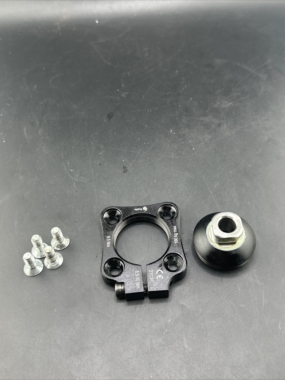Trulife, Black Prosthetic Rotator W/ Male Pyramid Screws. 210370AL
