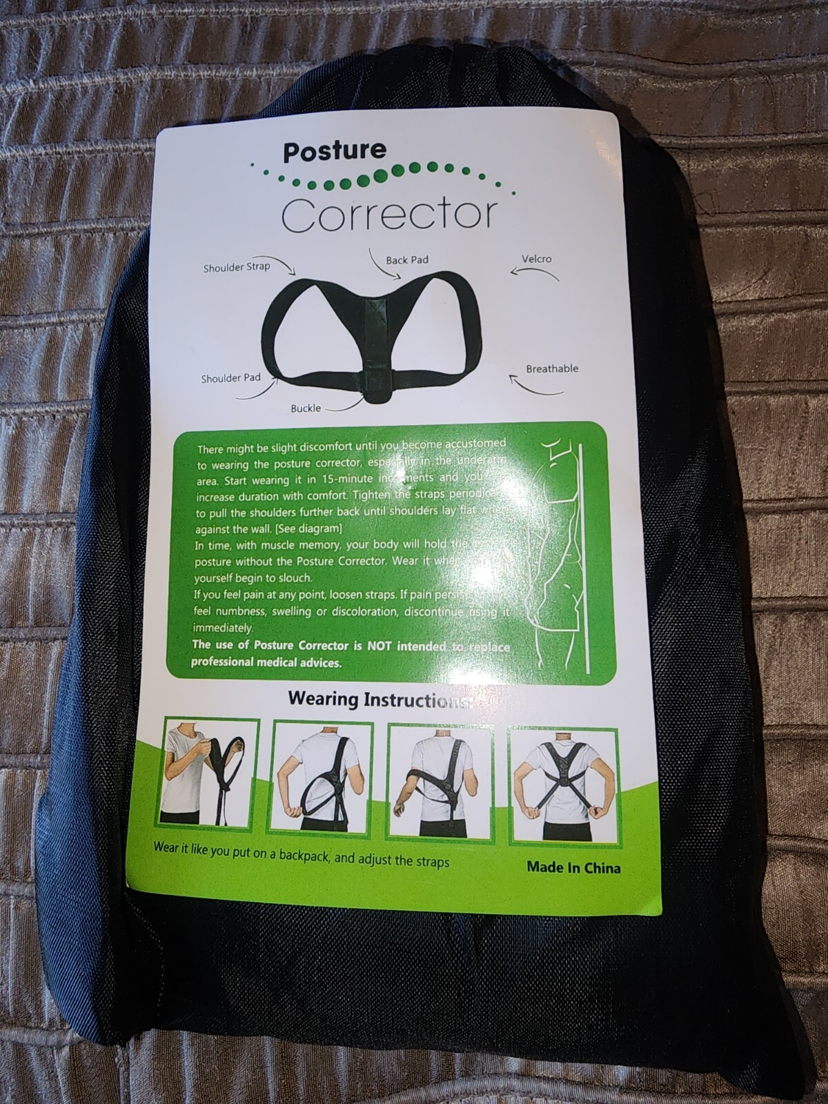 NWT Posture Corrector, black in color