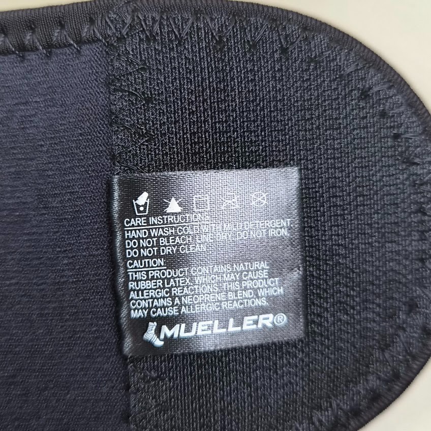MUELLER KNEE BRACE B300678 BLACK SELF-ADJUSTING KNEE STABILIZER UNISEX 0NE SIZE
