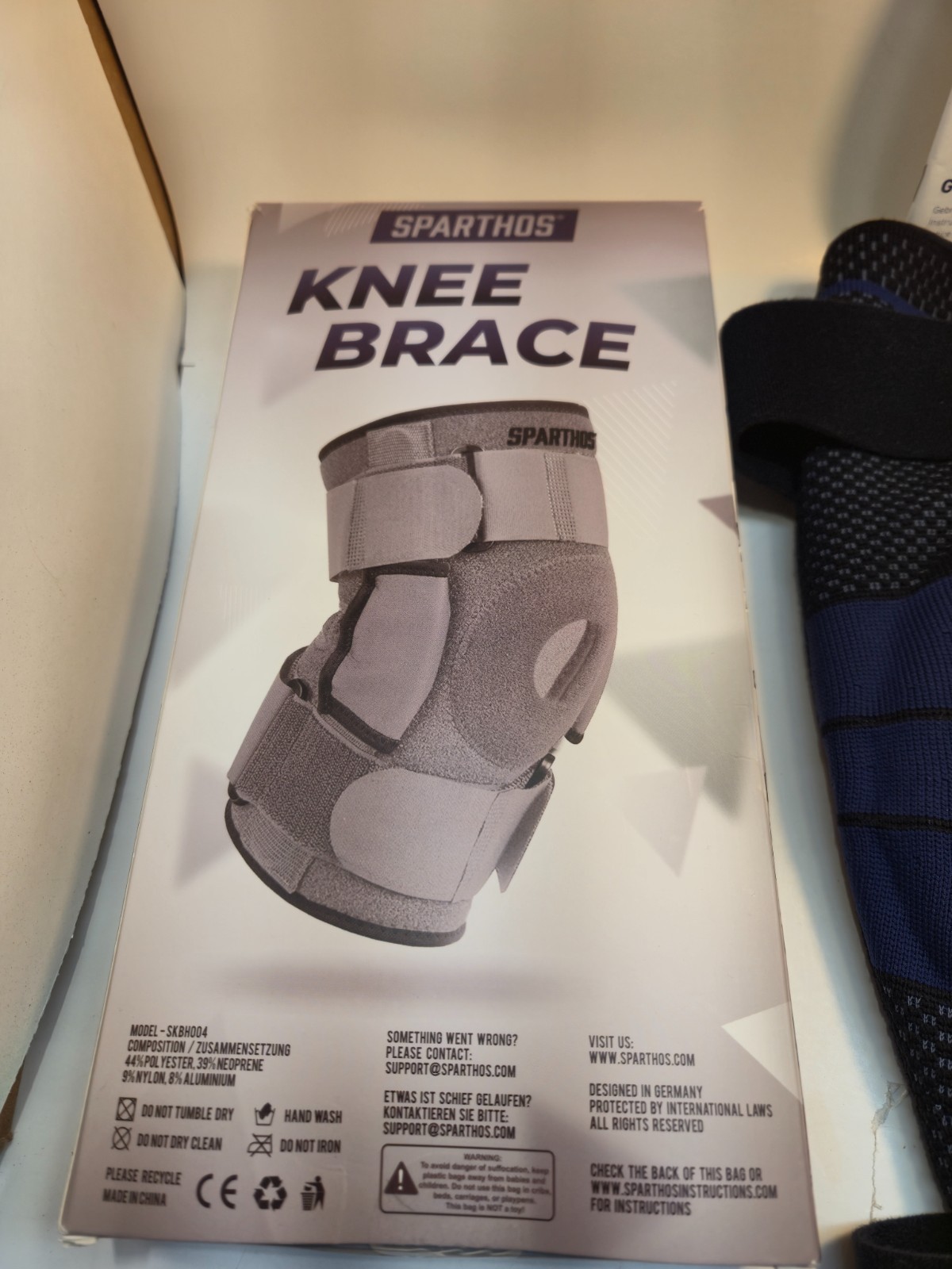 Sparthos Knee Brace and Bauerfeind GenuTrain S Knee Brace Bundle of 2