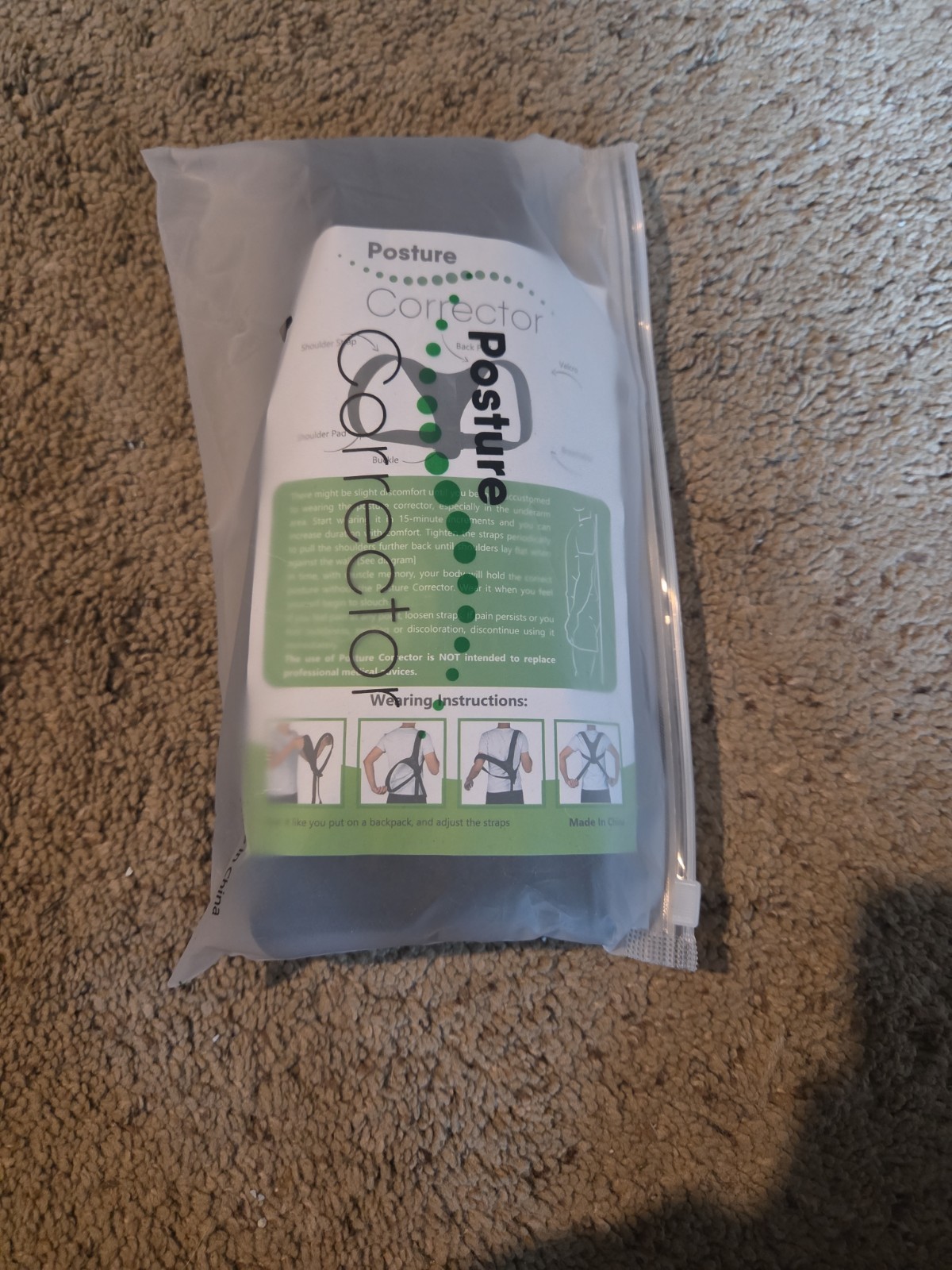 NWT Posture Corrector, black in color