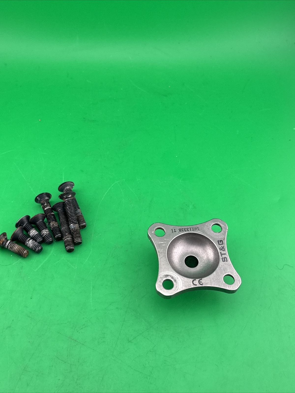 Prosthetic 4 Hole Plate Adapter Component. Titanium