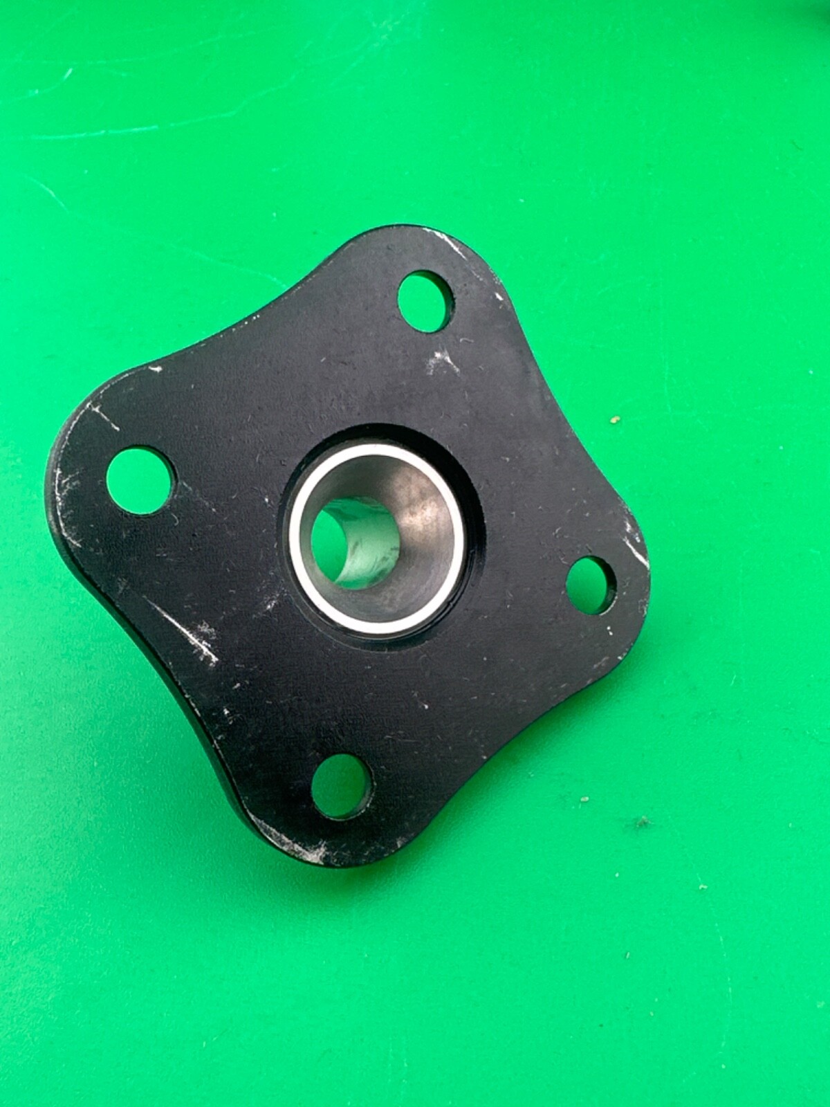 Prosthetic component adapter part. Trulife 4 four hole plate. AAA210