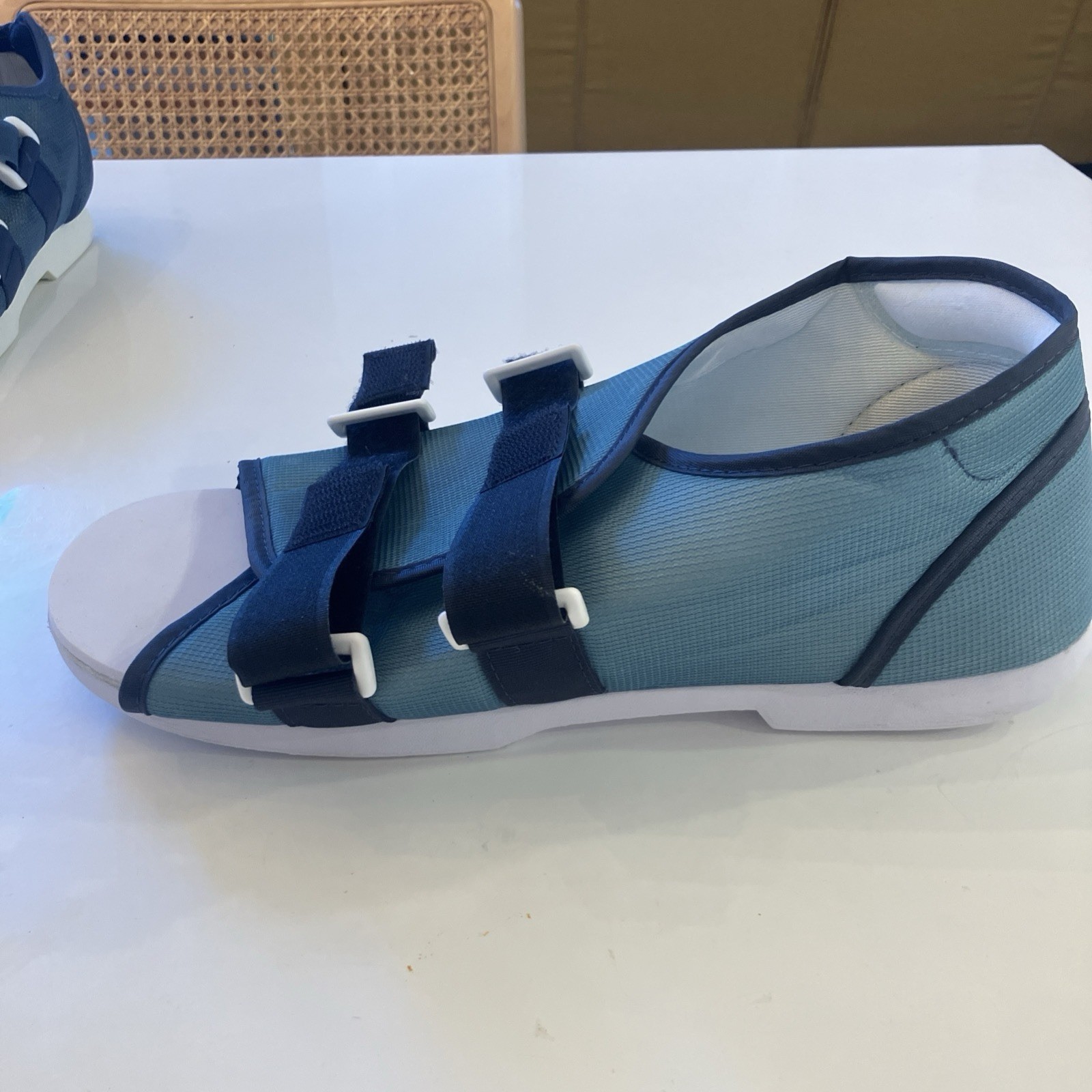 Walking boot and 2x post-op shoes