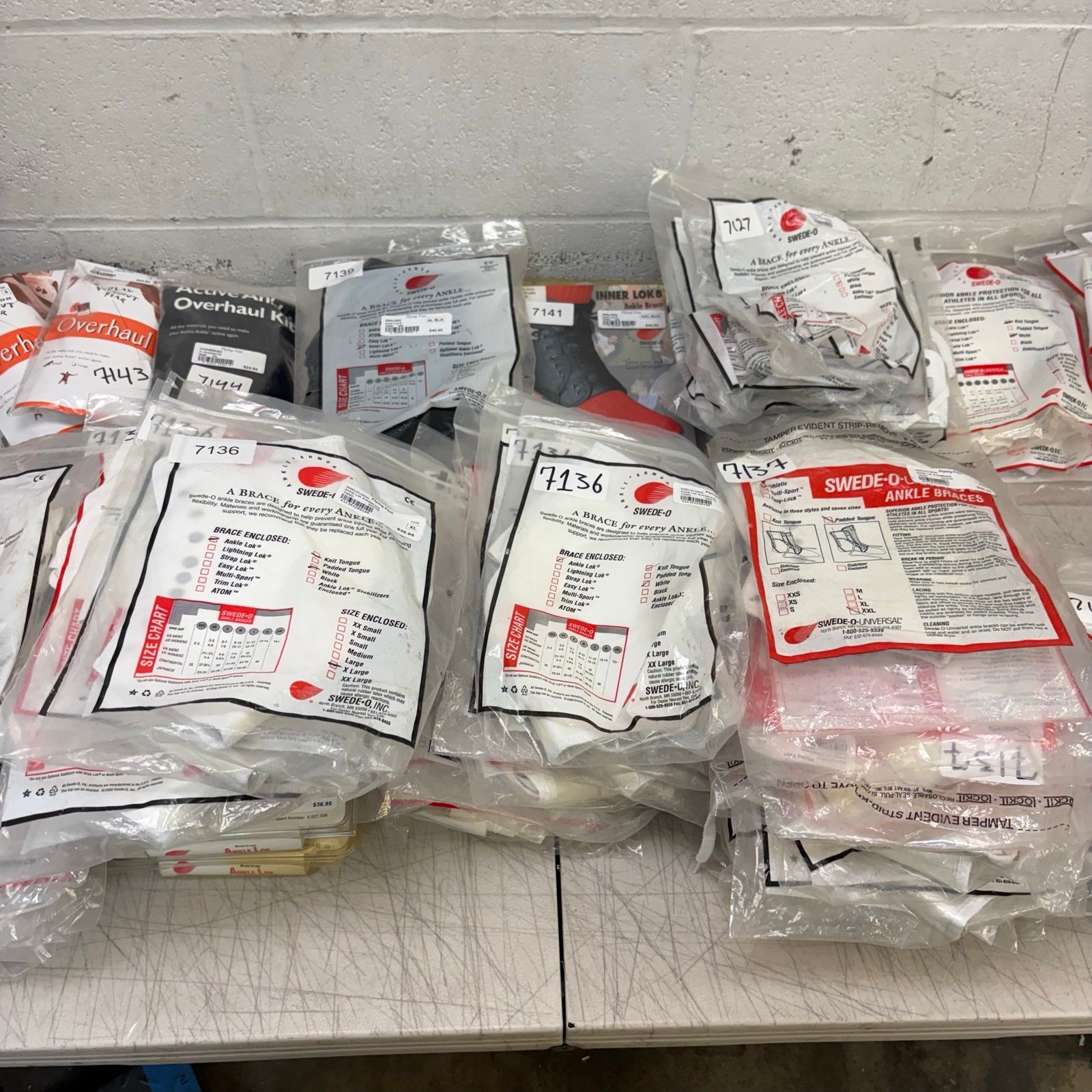 LOT-OF-85 Swede-O Ankle Braces, Assortment of Sizes, XXS-XXL, White & Black