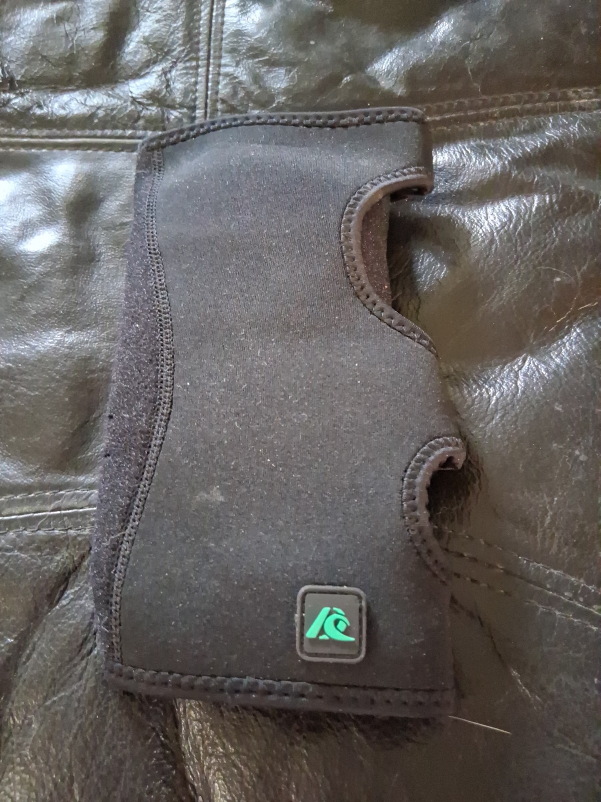 item appears to be a black P-TEX Pro Adjustable Wrist Stabilizer