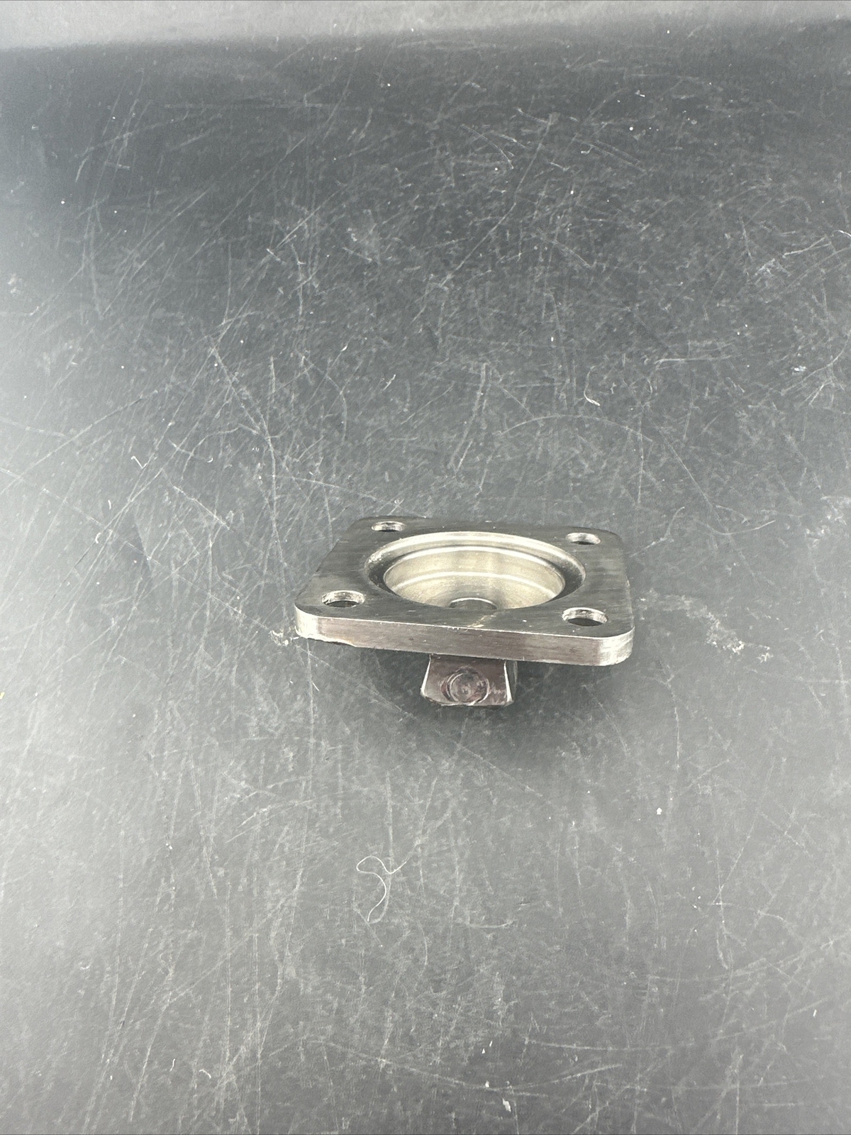 Prosthetic 4 Hole Plate Adapter Component.