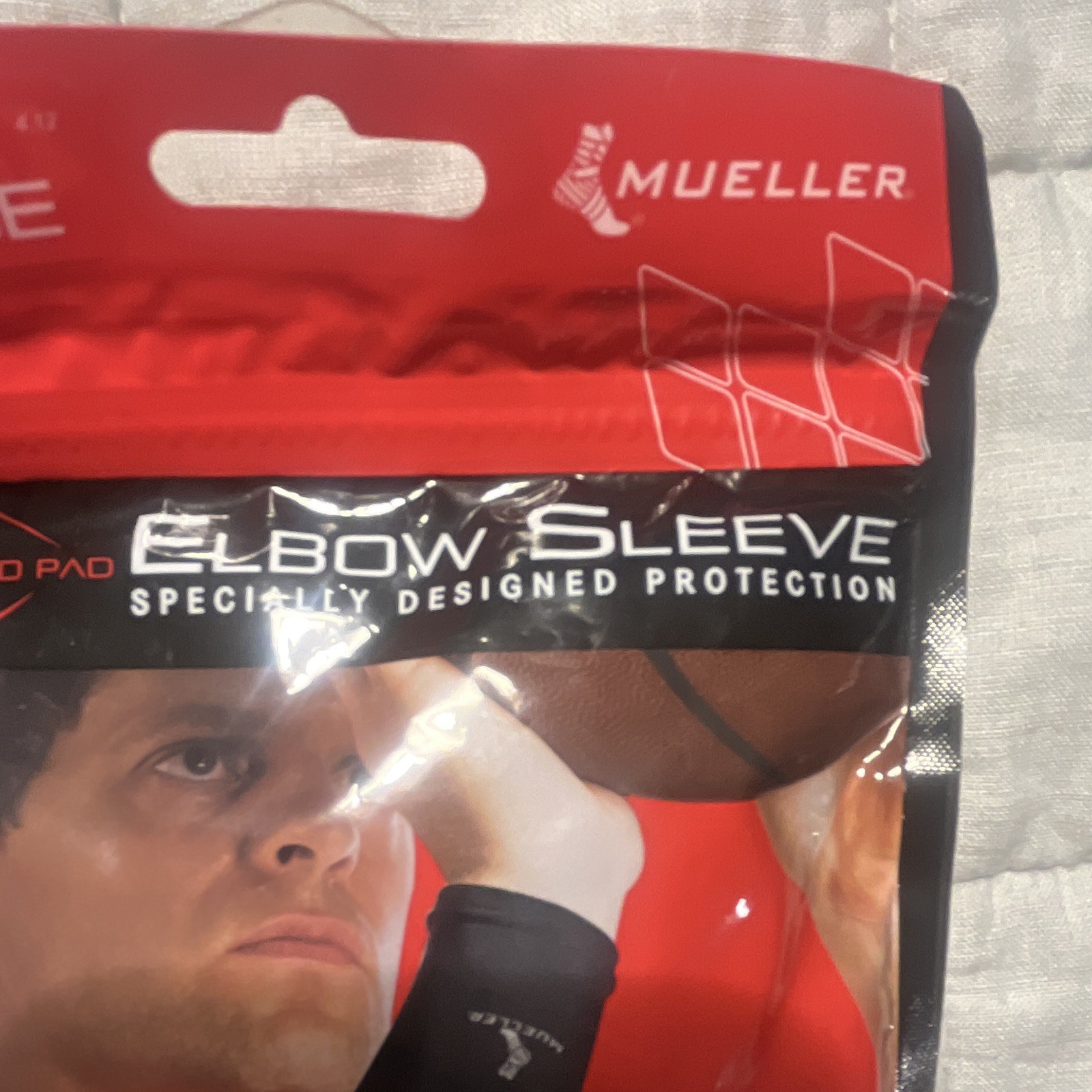 Mueller Elbow Compression Sleeve Antimicrobial Fits L/R XL Black 75704-BLACK