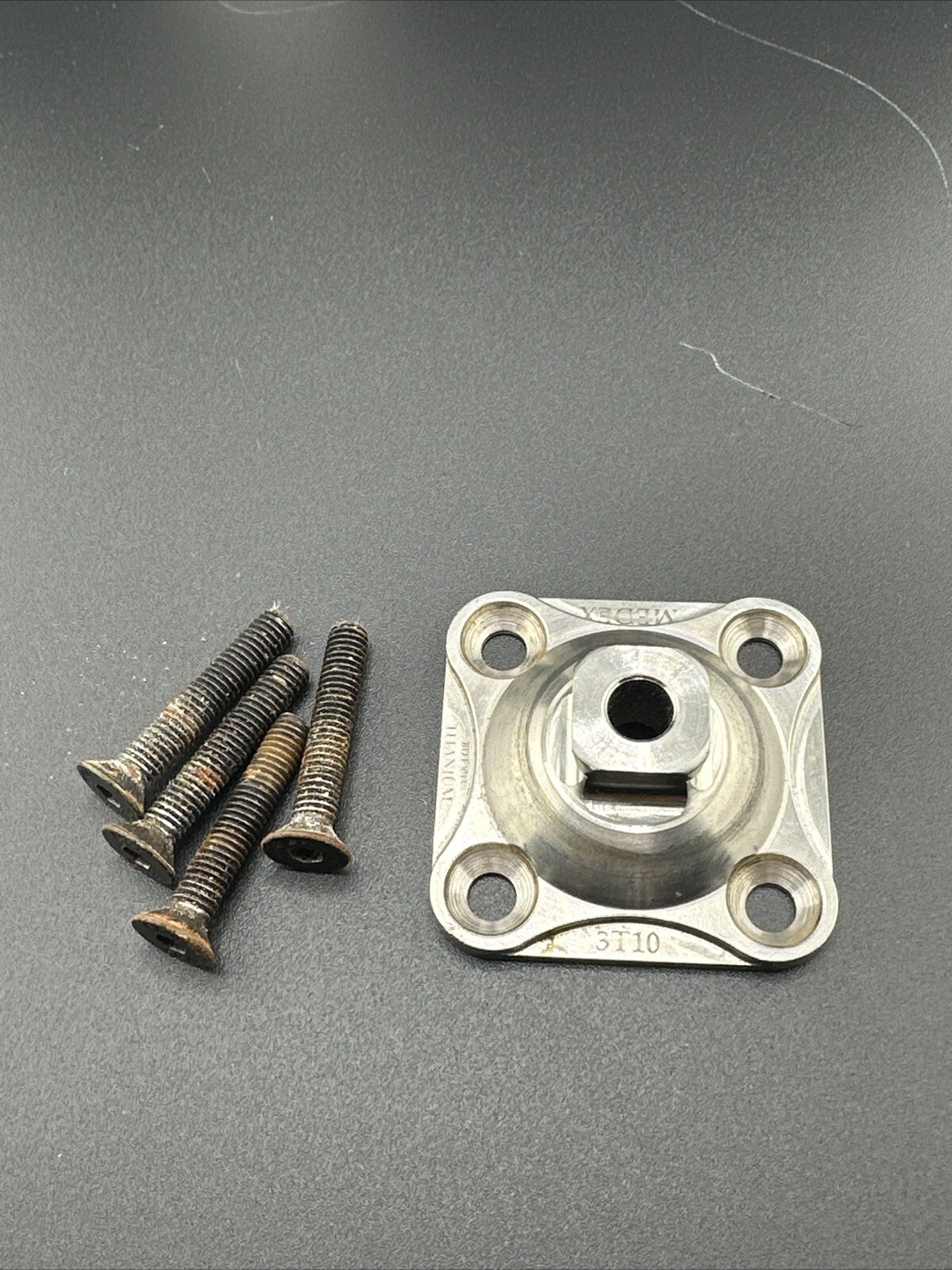 Medex 4 Hole Prosthetic Plate. Titanium.