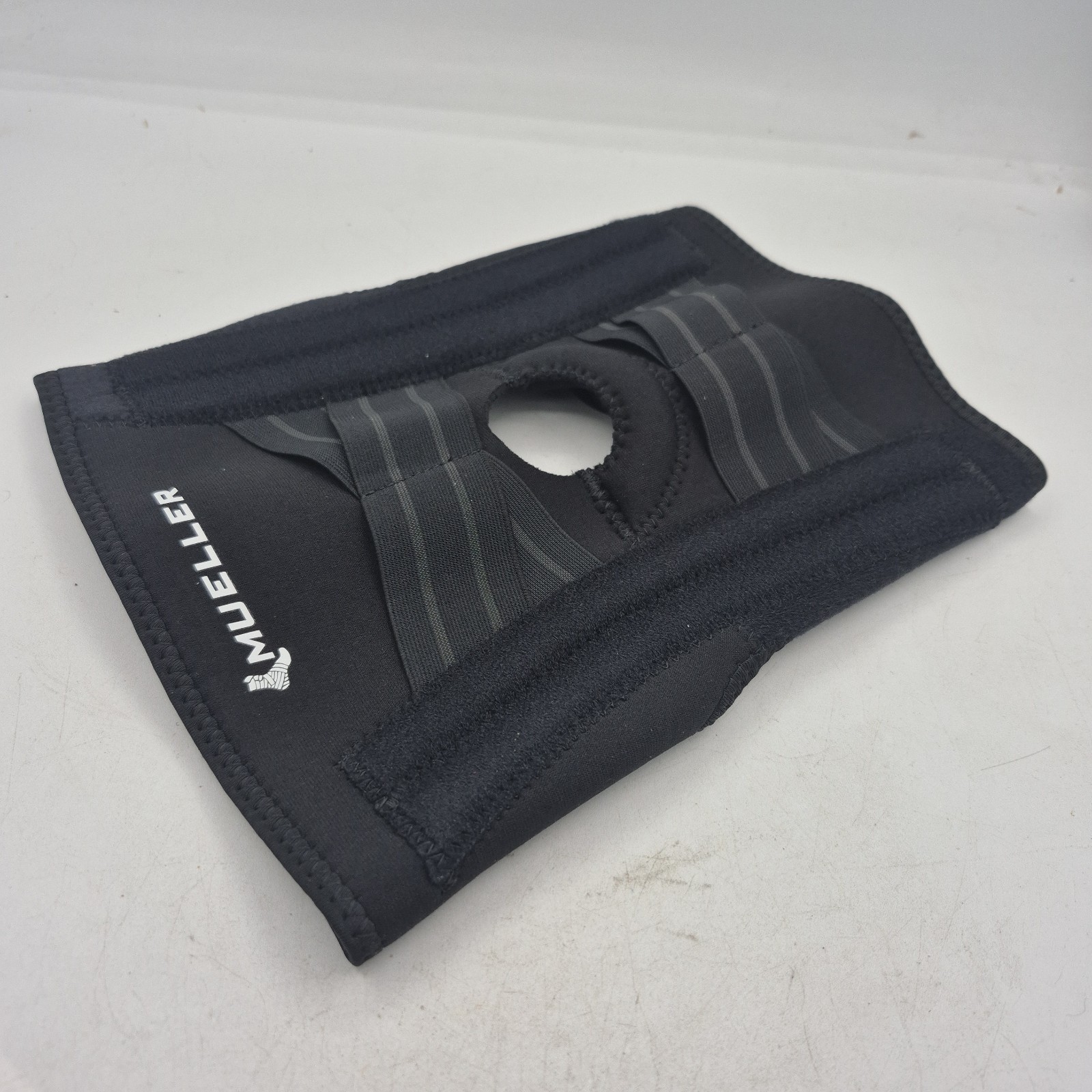 Mueller Self Adjusting Knee Stabilizer Black One Size Fits Most Moderate Support
