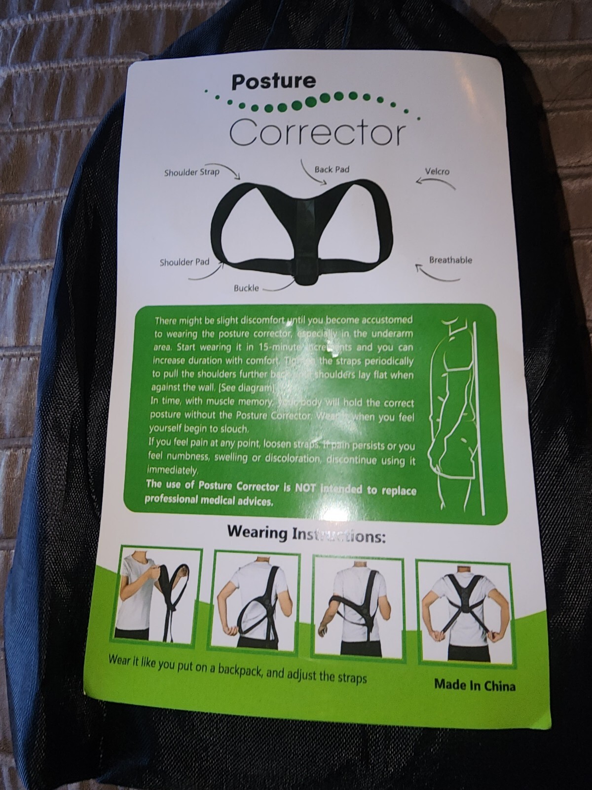 NWT Posture Corrector, black in color