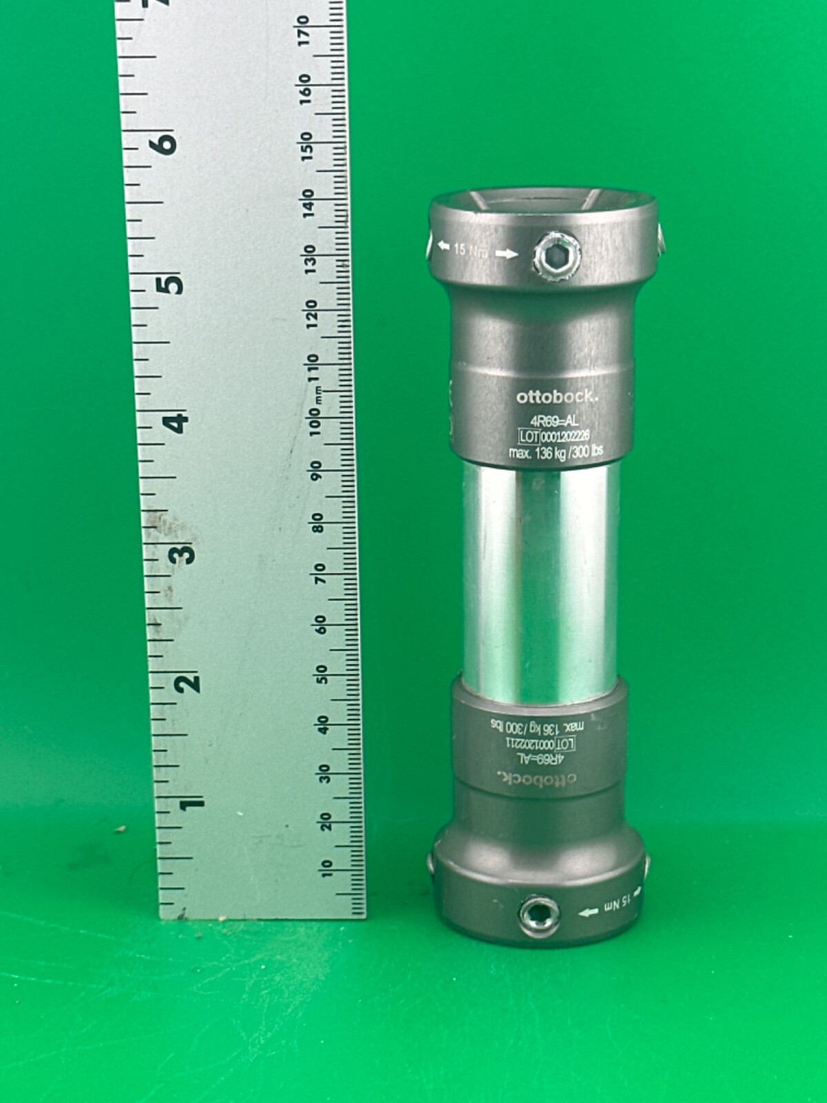 Prosthetic component adapter part. Otto Bock 4R69=AL prosthetic tube clamps.