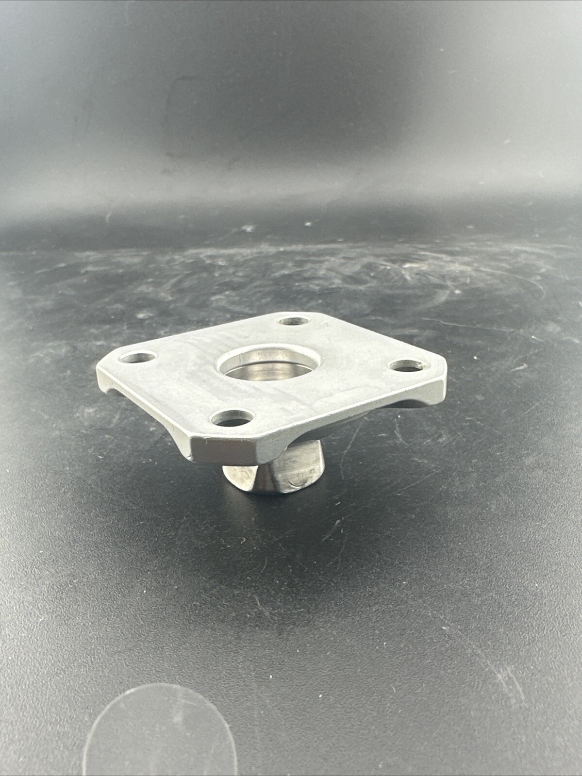 Ossur Prosthetic Four Hole plate Adapter Component.